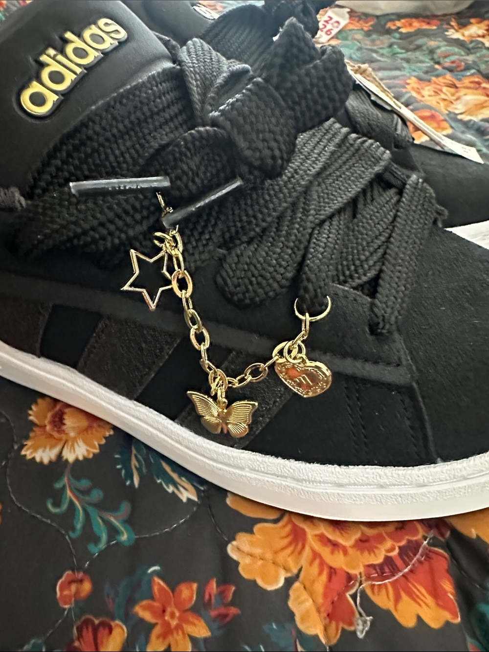 adidas Sneakers with Gold Accents and Charm
